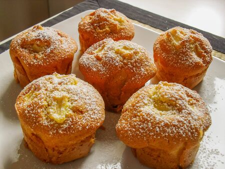 apple muffins with icing sugar on the topの写真素材