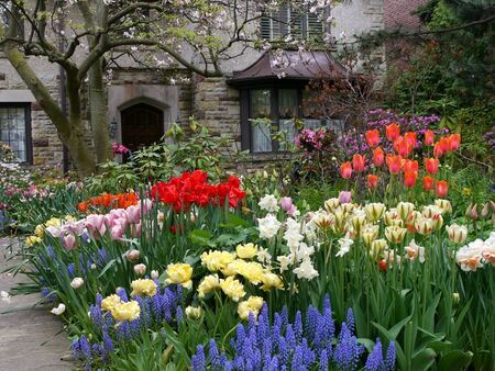 Lake Forest, Illinois, USA, May 14, 2011, old English style house with spring flowersのeditorial素材