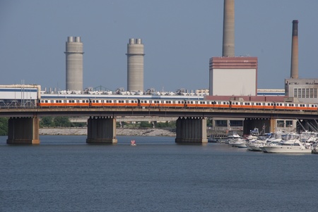 Boston, USA, July 2008 - Bridge over harbour with subway train and electric generating plantのeditorial素材