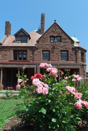 Newport, RI, USA, July 2008 - large old stone mansion with rose gardenのeditorial素材