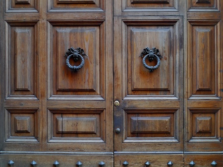 Rome, Italy, October 2011 - Wooden double door of old apartment buildingのeditorial素材