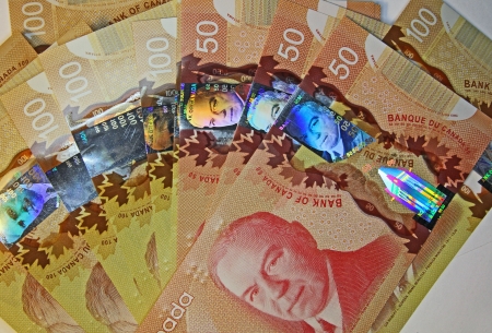 Toronto, Canada, June 2012 - new high tech Canadian polymer banknotes with holograms