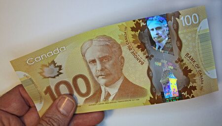 Toronto, Canada, June 2012 - new high tech Canadian polymer banknote with hologramsのeditorial素材