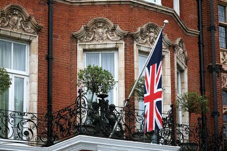 London, England - July  2009:  elegant Victorian hotel with Union Jack