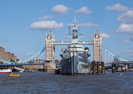 Thames with battleship and Tower Bridge, London, 2013のeditorial素材