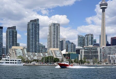 Fire boat speeding to an emergency on Toronto's waterfrontのeditorial素材