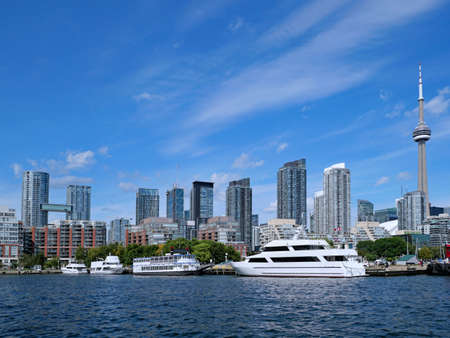 Toronto, Canada - September 3, 2021:  High rise apartment buildings and boating marinas line the Lake Ontario waterfront in the western part of downtown Toronto.のeditorial素材