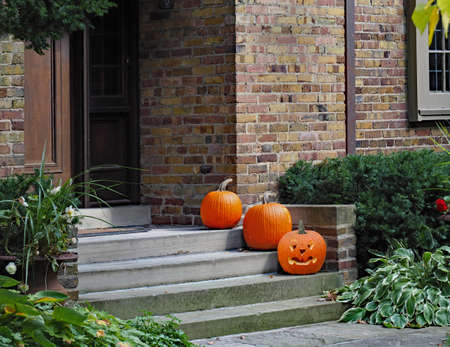 Front steps of house with pumpkins for Halloweenの写真素材