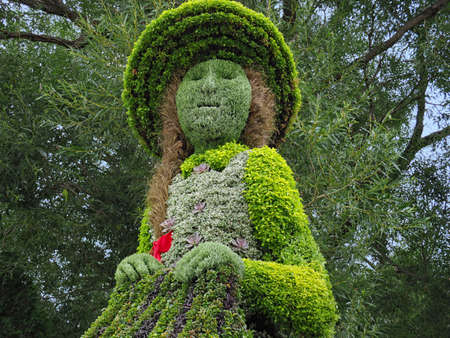 OTTAWA - AUGUST 21, 2018:  Jacques Cartier park has a display of  topiary sculptures made up of thousands of tiny plants, this one depicting Anne of Green Gables.のeditorial素材