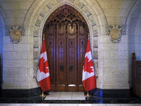 OTTAWA - AUGUST 2018: The Canadian Parliament Building is constructed with ornate gothic styling as seen in these interior details of the entrance to the House of Commons.のeditorial素材