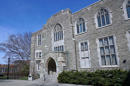 Gothic style stone college building with leaded glass windowsのeditorial素材