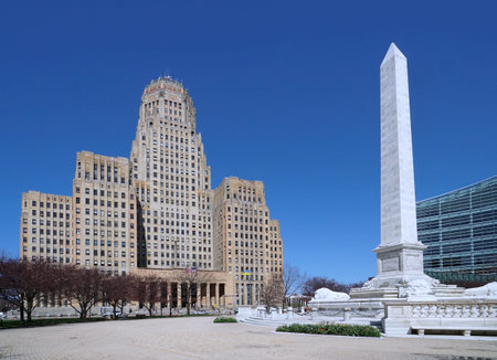 Buffalo, NY - April 2022:  The art deco style city hall building in Buffalo, with a monument to President McKinley, who was assassinated there in 1901のeditorial素材