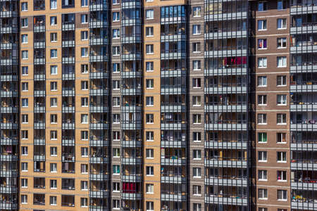 Brick Facade in Daylight of Skyscrapers Apartment Buildings Residential Blocks Detail Texture Background Saint Petersburg City Russiaの写真素材