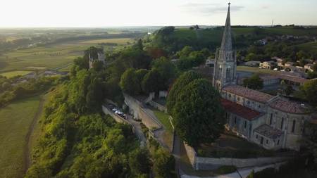 Aerial view of church of sainte croix du mont at sunset, sainte croix du mont, franceの写真素材