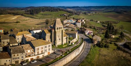 LOT-ET-GARONNE, SAINT PASTOUR, AERIAL VIEW OF THE CHURCH AND THE VILLAGE, FRANCEの写真素材