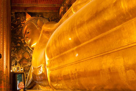 Inclined Buddha at Wat Phoの写真素材