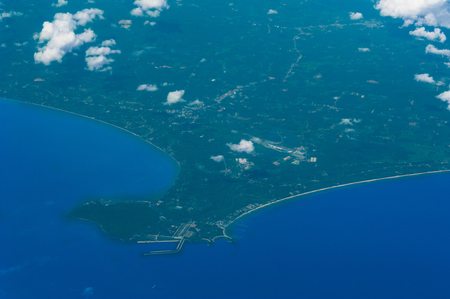 Land Sea and Cloud from Air Planeの写真素材