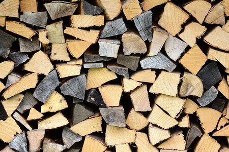 Logs in front of a wall
