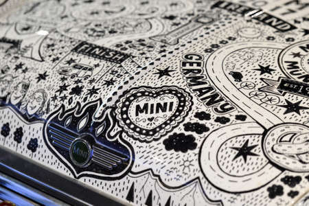 A decorated small car Mini - Mini is the name of a car model that was originally built by the British Motor Corporation from summer 1959 to autumn 2000のeditorial素材