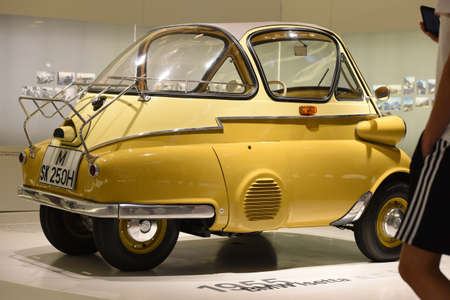 A BMW Isetta at BMW Museum in Munich (Bavaria, Germany). It shows the entire history of the cult...