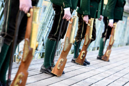 Old year shooting in Bad Ischl - Since 1987 the Bad Ischler Prangerschützen have been saying goodbye to the old year at the Esplanade and wish them luck and health for the new. Numerous visitors from near and far live this noisy and imposing traditionのeditorial素材