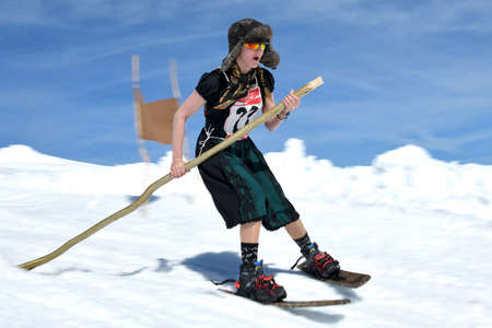 Quaint barrel stave race - barrel staves are the curved boards that give shape and hold to a barrel. You need a lot of acrobatic skill to drive.のeditorial素材