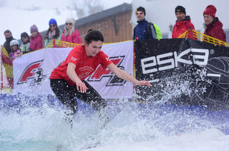 At the watersplash, the participants have to ski or snowboard over a 10 meter long water pool. With...