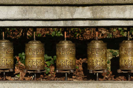 Tibetan prayer wheels in Salzburg Zoo, Austria, Europeの写真素材