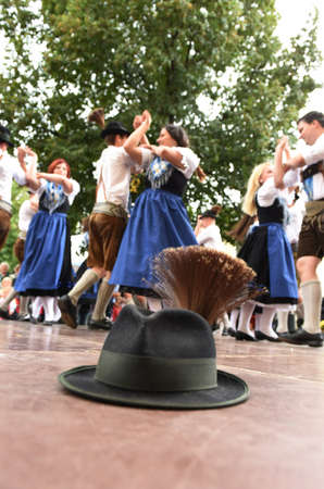 Public performance of a traditional Austrian folk dance at the farmers' market in Mondsee, Austriaのeditorial素材