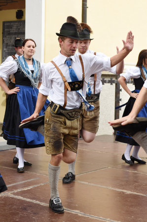 Public performance of a traditional Austrian folk dance at the farmers' market in Mondsee, Austriaのeditorial素材