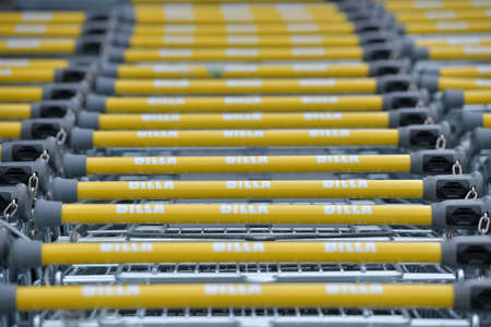 Shopping carts in a row outside a supermarketのeditorial素材