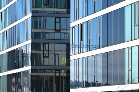 Modern glass facade of an office building in Linz, Austria