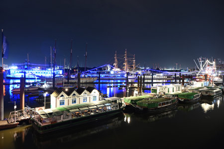 Impression of the old port of Hamburg on the Elbe at night, Germanyのeditorial素材