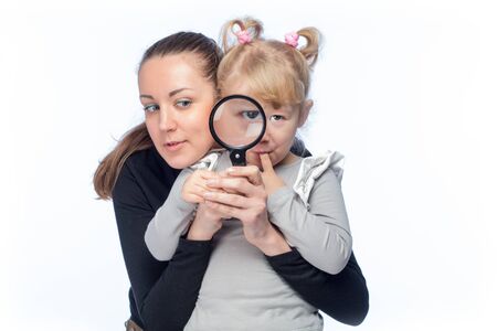mother and small daughter looking at a beautiful worldの写真素材