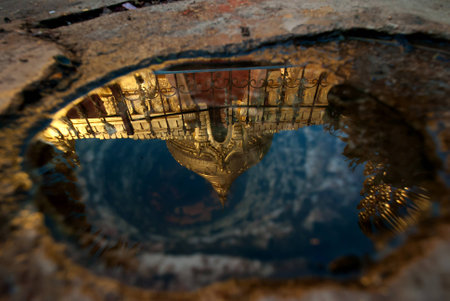Reflection of Shwezigon Pagoda or Shwezigon Paya in Bagan, Myanmar.の写真素材