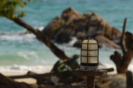 Lamp with sea background  at Koh MUNNORK Island , beautiful island in Rayong , Thailand.の写真素材