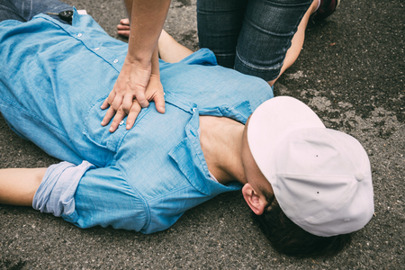 Emergency CPR on a Man who has Heart Attack , One Part of the Process Resuscitation (First Aid)の写真素材