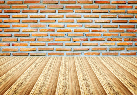 Wooden floor and brick wall texture background, interior design concept.の写真素材