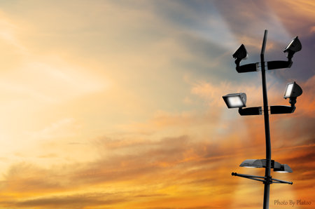 Street lights against a sunset sky. 3D illustration. Copy space.