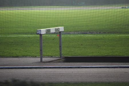 race track with a hurdle in a stadiumの写真素材