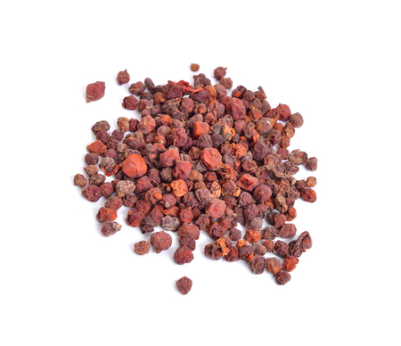 Schisandra chinensis, magnolia-vine, Chinese magnolia-vine, schisandra, magnolia berry, five-flavor-fruit,  wu wei zi. Dried fruit isolated.の写真素材