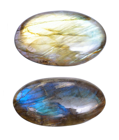 Two Polished blue labradorite Caboshons. Isolated on white background.の写真素材