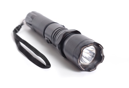 Shocker, Taser, Means of self-defense. Flashlight tazer isolated on white backgroundの写真素材