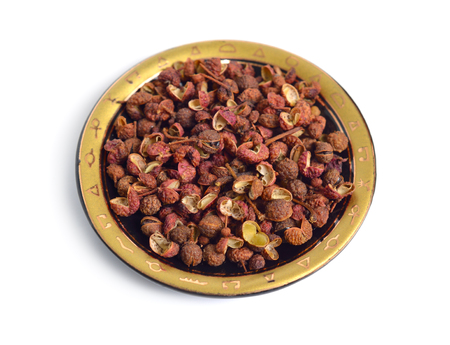 Sichuan pepper, Sichuan peppercorn, Szechuan pepper or Szechuan peppercorn isolated on white background.の写真素材