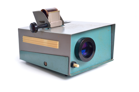 Vintage slide projector is an opto-mechanical device for showing photographic slides. Isolated on white.の写真素材