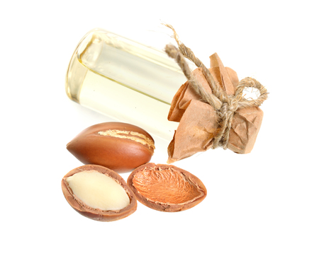 Argan seed oil. Isolated on white background.の写真素材