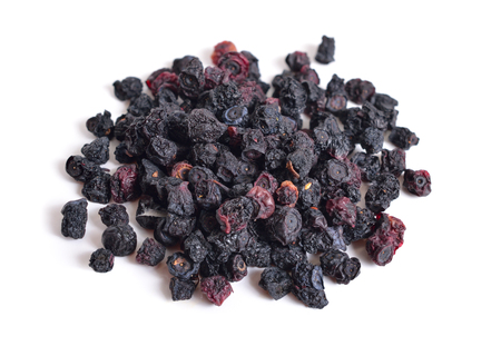 Dried bunch of blueberries isolated on white background.の写真素材
