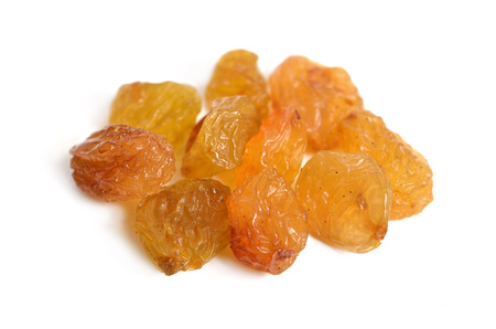 A raisin is a dried grape isolated on white background.の写真素材