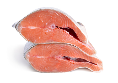 Pieces of pink salmon isolated on white backgroundの写真素材
