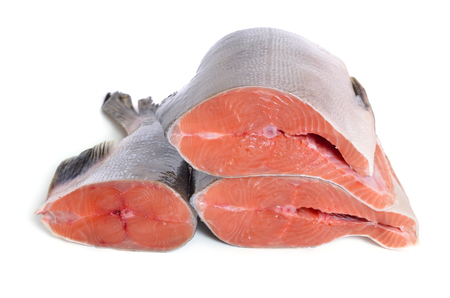 Pieces of pink salmon isolated on white backgroundの写真素材